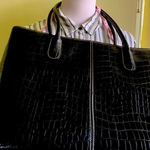 Large black tote bag, gently used. No rip or odors.